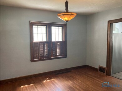 Formal Dining Room with HWD floors !