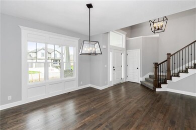 View of entry from formal dining. Beautiful Hardwo
