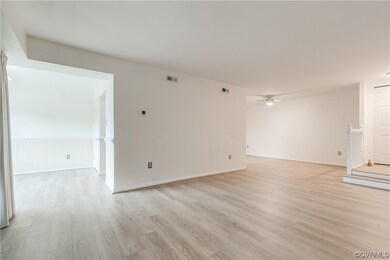 A view of the living room looking into the breakfa