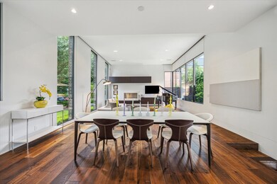The dining area flows seamlessly within the open l
