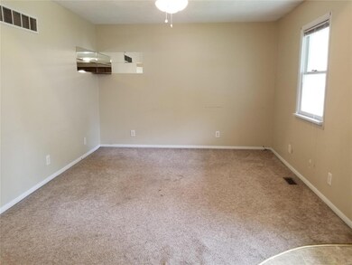 Spacious living room with lots of natural lighting