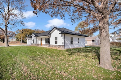 201 W Morgan St, Inman, KS 67546 - photo 2