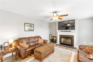 Living room featuring wood finished floors, ceilin