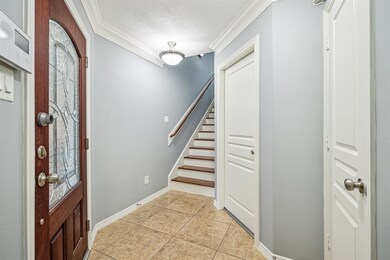 The first floor features an oversized secondary be