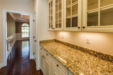 Butlers pantry/china storage between kitchen and d