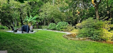 Lush green oasis is terraced several feet above the natural area. If you like the outdoors, you will love this sanctuary.