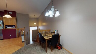 Inviting entry w/tiled floors and high ceilings.