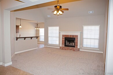 From the entry way, large living area with vaulted