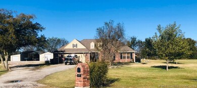 Gorgeous brick home with shop, covered RV parking,