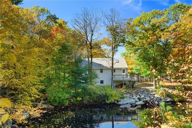 Rock Quarry Pond and back of home