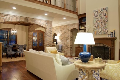 Formal Living Room with amazing brick work and ope