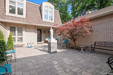 Mature Japanese maple enhances the courtyard