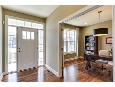 The inviting foyer opens to both the office and di