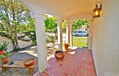 Tiled covered entryway and private courtyard