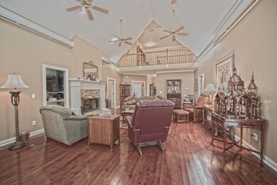 LIVING ROOM IS EQUIPPED WITH FOUR CEILING FANS AND PATIO ACCESS! 1310 SHAGBARK TRAIL MURFREESBORO, TN 37130