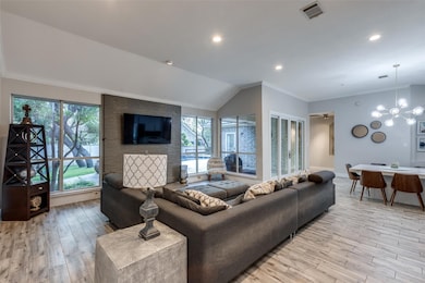 Living area featuring plenty of natural light, li