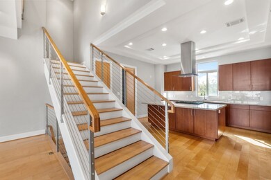 Beautiful maple wood floors and modern stairway wi