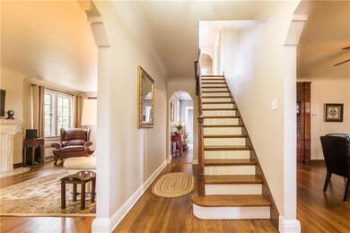 The gracious entry and beautiful architectural fea