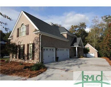 Exterior Front. Attached three car garage