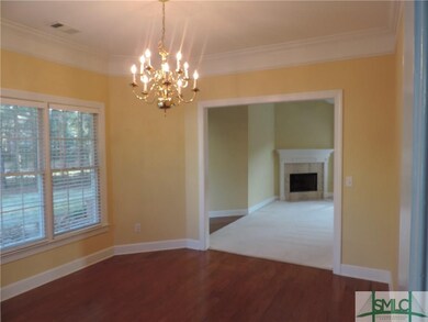 Dining room is just off Foyer and Great Room.