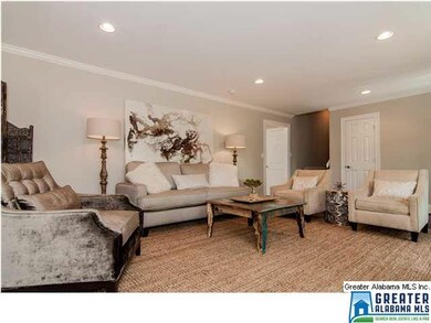 The living room welcomes you into the home with re