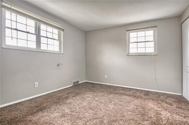 Master  bedroom with newer carpet and attached pow