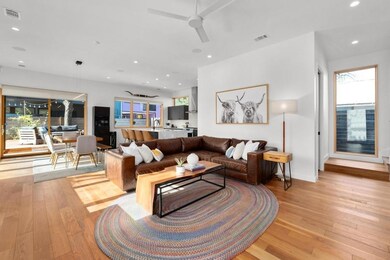 Living area featuring light wood finished floors,