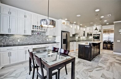 Large eat-in-kitchen plus formal dining, extra cab