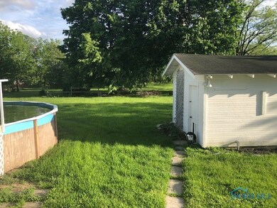 Incredible .77 acre lot and large storage shed