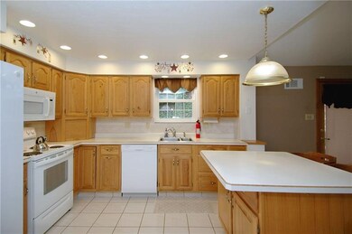 Lots of cabinet space and recessed lighting in the