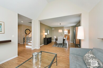 Living room leads into the formal dining room