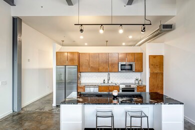 Sophisticated gourmet kitchen equipped with stainl