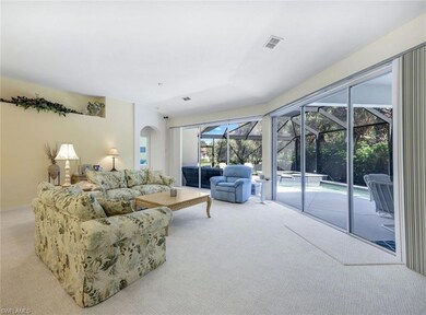 View of the living room and pool/patio