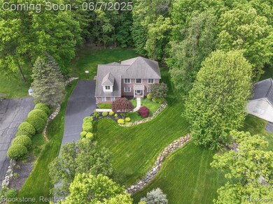 Set in private Pebble Creek of Springfield Township