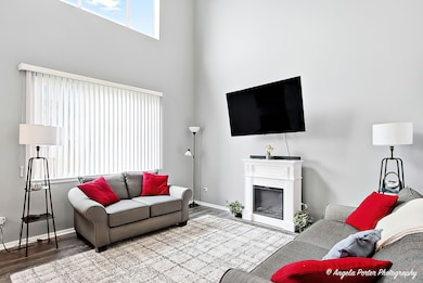 Transom Windows Show Off High Ceilings and Cascade