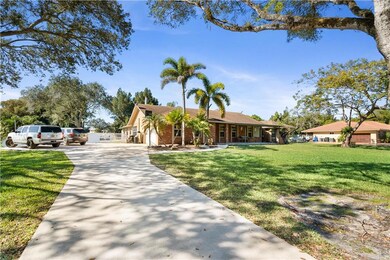 Long Driveway & Garage Area - South Side Of Home