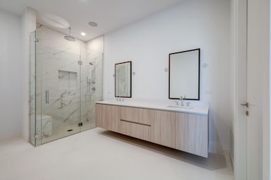 Primary Bathroom features Pedini cabinets, double