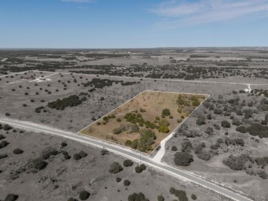 Bird's eye view with a desert view and a rural vi