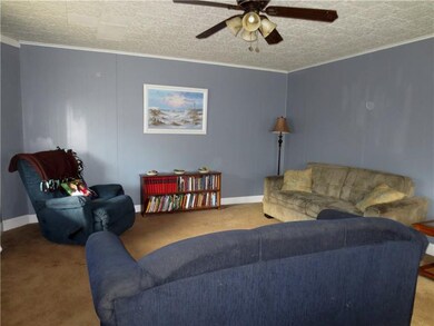 Another view of the spacious living room.