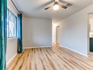 Living room new wood floors, fresh paint, new ceil