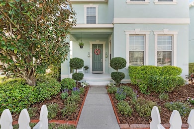 The very welcoming curb appeal has a picket fence and fresh landscaping.