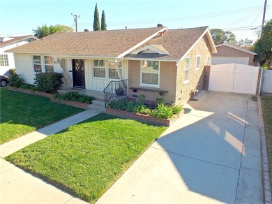 Nice curb appeal with freshly painted exterior & gated driveway.