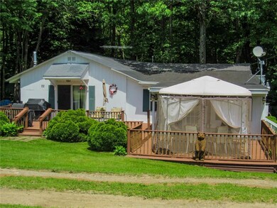 Front of home from the dock. The enclosed screen o