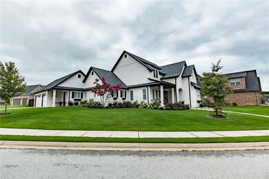 Home sits on a corner lot with side entry over siz