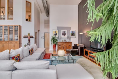 Large living area with tons of wall space for your art collection.