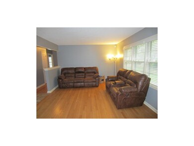 Living Room View with Large Windows & Natural Ligh