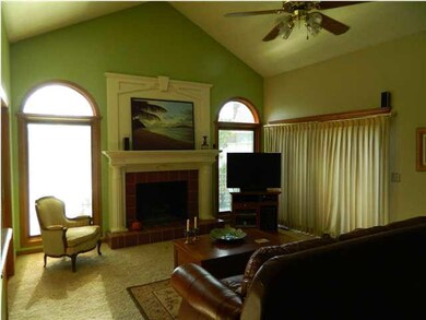 Vaulted ceilings, fireplace in living room