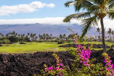 From the balcony with expansive views of the Mauna Lani South Course and Kohala Mountains.