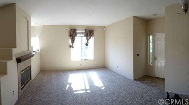 Entry Formal Living Room and Dining Room with Fire