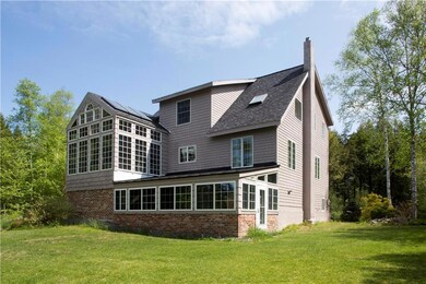 Rear exterior shows window glass in...